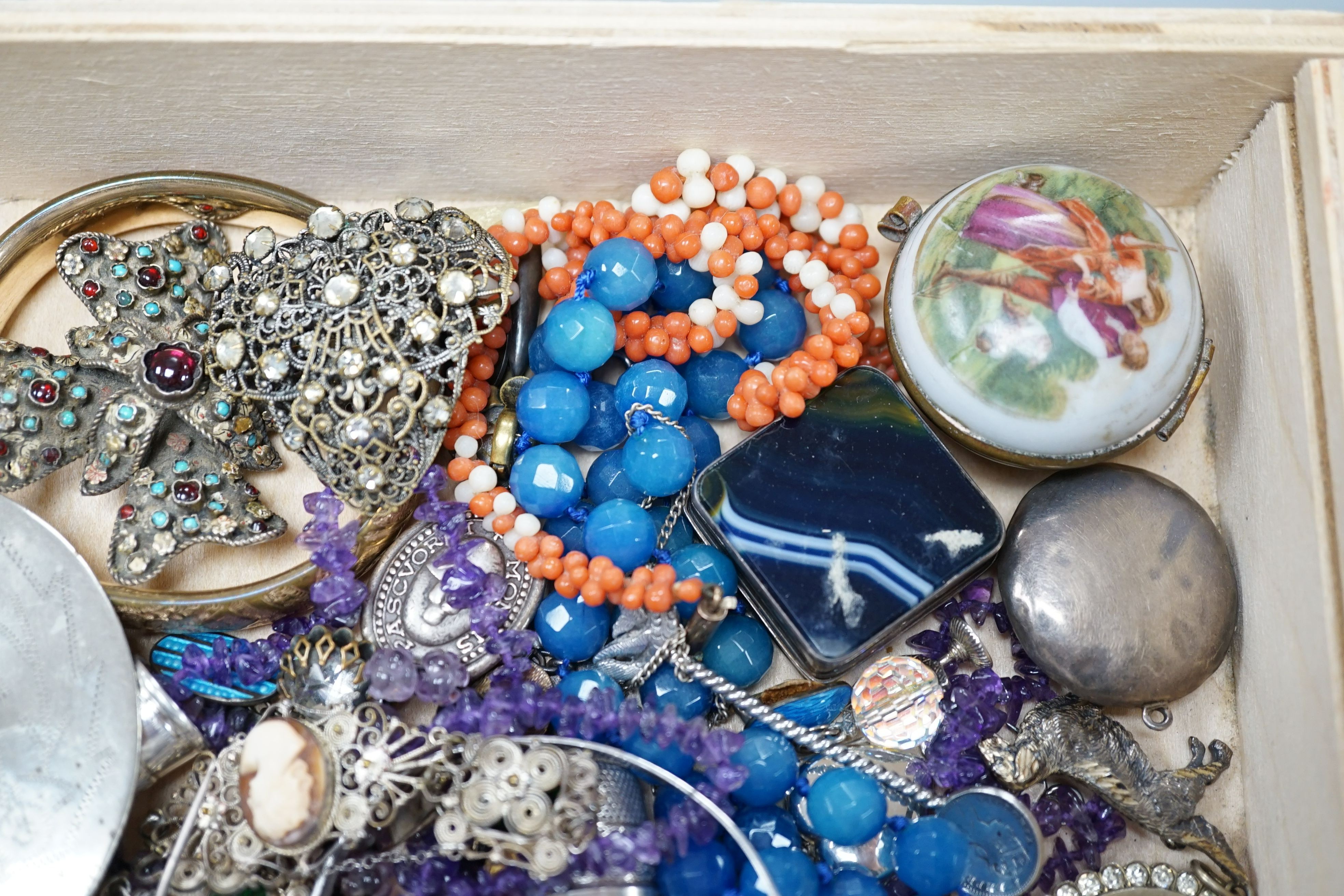 A group of assorted mostly costume jewellery including a Scottish brooch